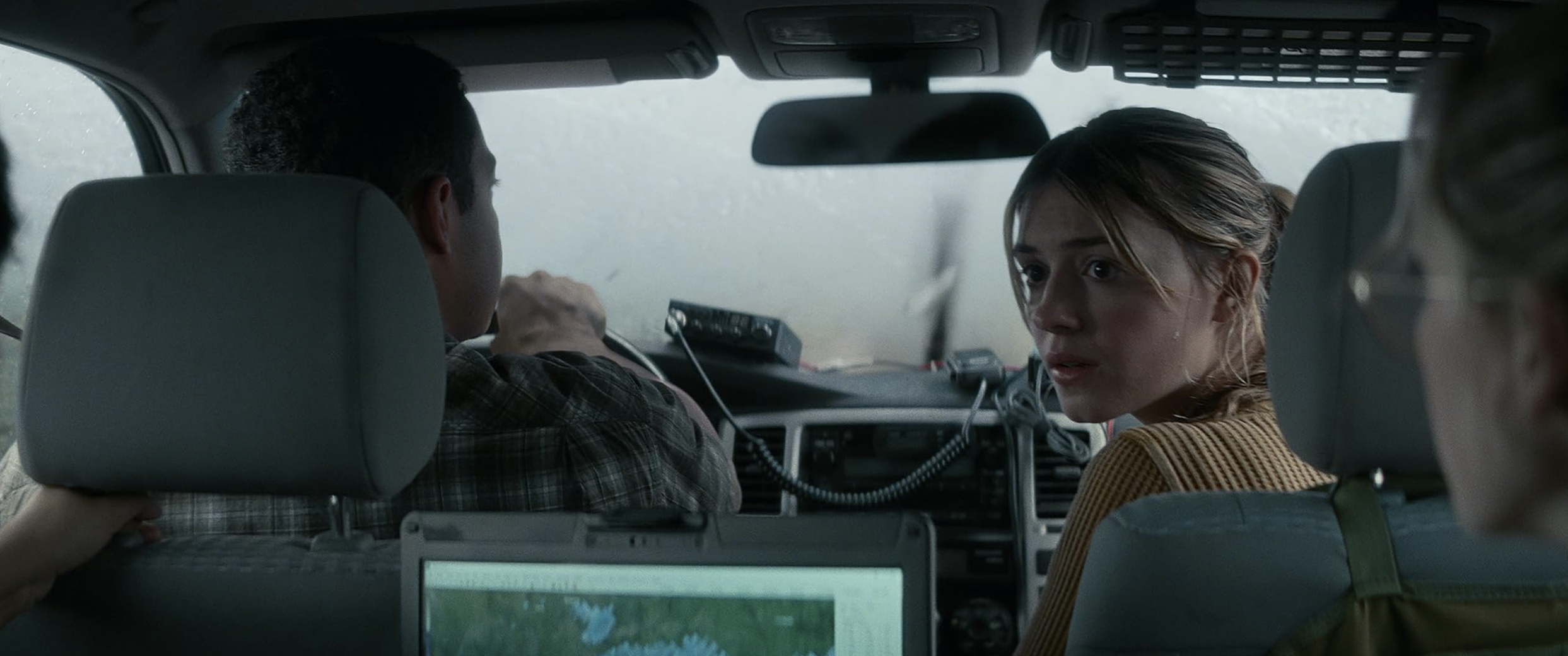 Daisy Edgar-Jones faces her "Twisters" co-stars inside a car. The sequel to the 1996 blockbuster "Twister" will hit cinemas Friday. (Courtesy of IMDb)